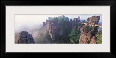 Bridge passing through cliffs, Bastei Bridge, Saxon Switzerland National Park, Dresden, Saxony, Germany