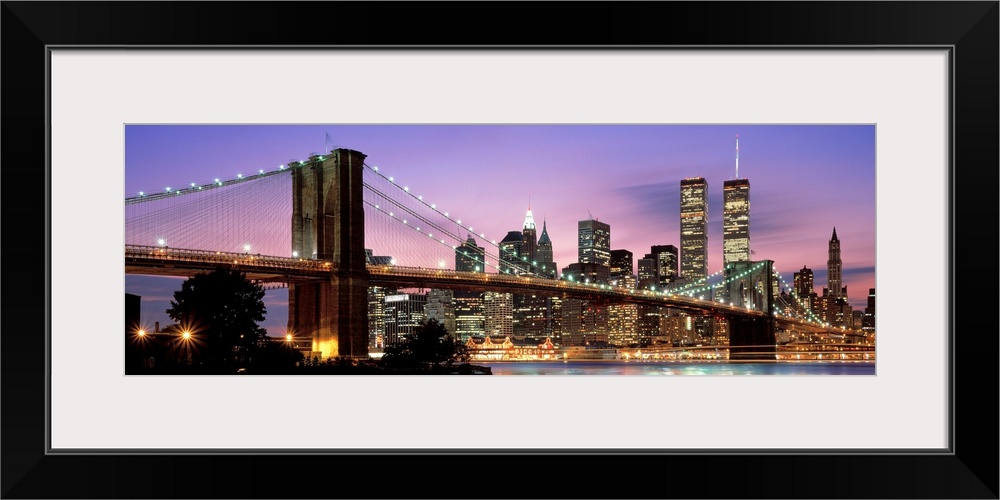 This large wall art has a dominating sky at twilight giving a panoramic view of lower Manhattan and Brooklyn Bridge before...