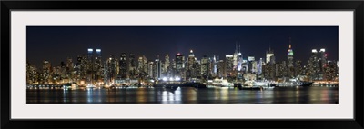 Buildings in a city lit up at night, Hudson River, Manhattan, New York City, New York State,