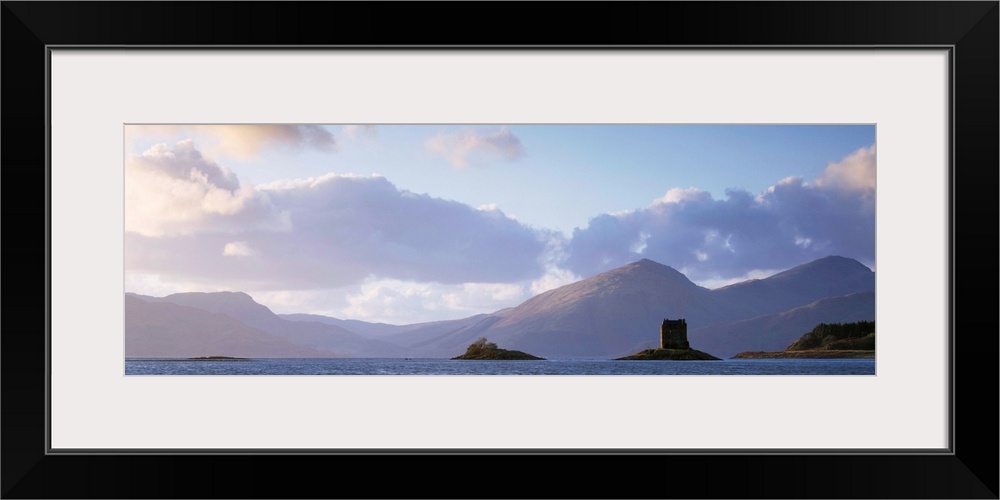 Castle at dusk with mountains in the background, Castle Stalker, Argyll, Scotland