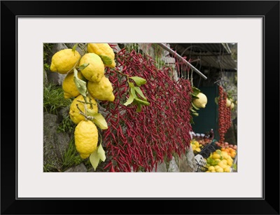 Close-up of lemons and chili peppers in a market stall, Sorrento, Naples, Campania, Italy