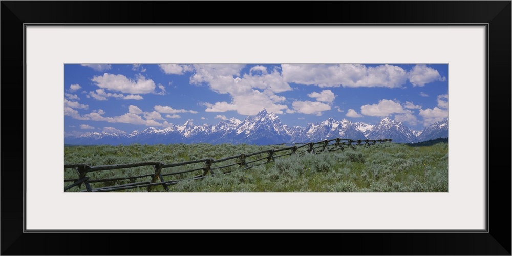 Clouded sky over snow covered mountains, Grand Teton, Grand Teton National Park, Wyoming