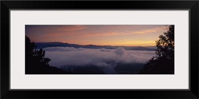 Clouds over a lake at sunrise, Fontana Lake, North Carolina