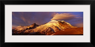 Clouds over a mountain at dawn, Mt Rainier, Mt Rainier National Park, Washington State