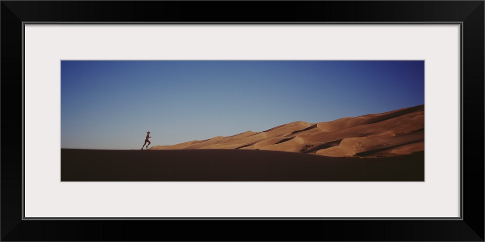 Colorado, Great Sand Dunes National Monument, Runner jogging in the park