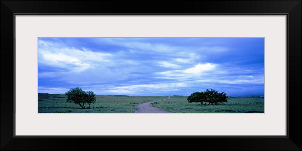 Country road passing through a landscape, Kansas