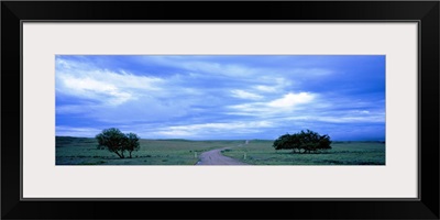 Country road passing through a landscape, Kansas