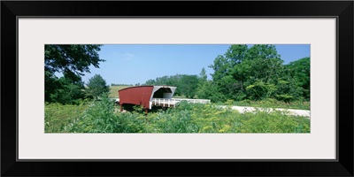 Covered bridge in a forest, Cedar covered bridge, Madison County, Iowa