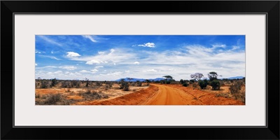 Dirt road passing through Tsavo East National Park, Kenya