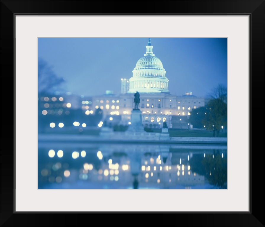 Large photograph of the front of the United States Capitol Building in Washington, D.C. Everything but the top of the Capi...