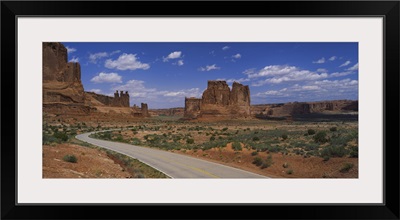 Empty road running through a national park, Arches National Park, Utah