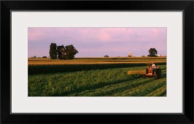 Farmer harvesting a field, Lancaster County, Pennsylvania