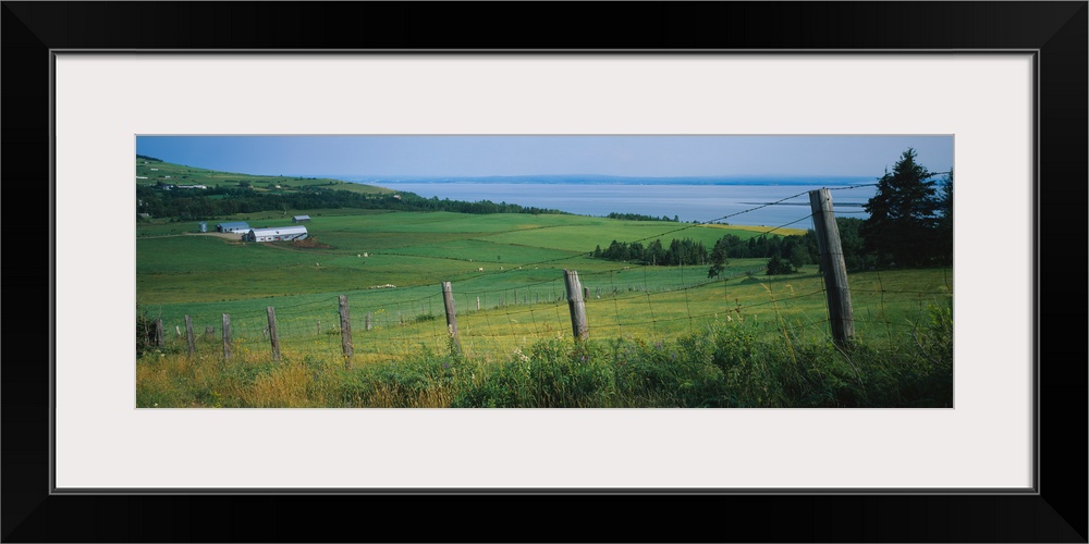 Fence in a field, Charlevoix, Quebec, Canada