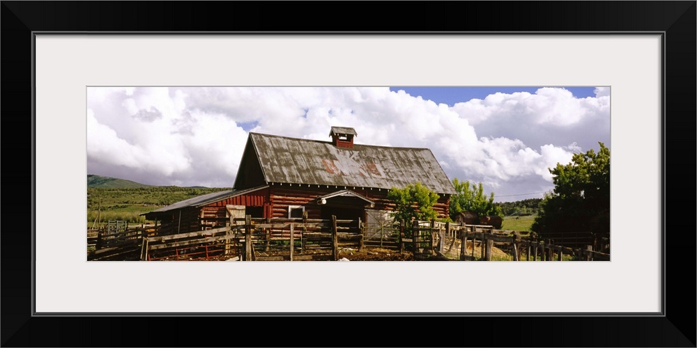 Fence in front of a barn, historical barn, Collbran, Colorado