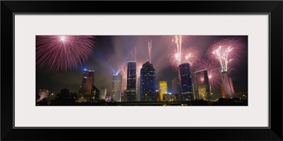 Fireworks over buildings in a city, Houston, Texas