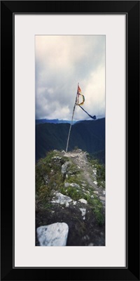 Flag on a mountain top Machu Picchu Cusco Region Peru