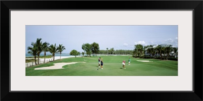 Four people playing golf, South Seas Plantation, Captiva Island, Florida