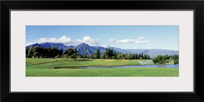 Golf course in front of mountains, Princeville, Kauai, Hawaii
