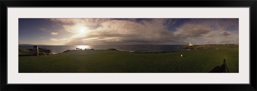 Golf course with a lighthouse in the background, Turnberry, South Ayrshire, Scotland