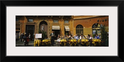Group of people at a sidewalk cafe, Rome, Italy