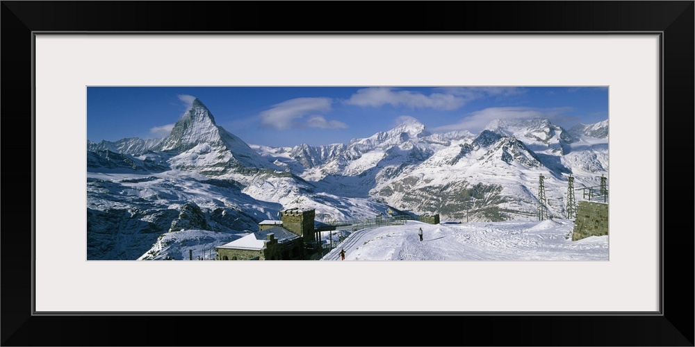 Group of people skiing near a mountain, Matterhorn, Switzerland