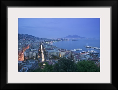 High angle view of a city at dusk, Mt Vesuvius, Naples, Campania, Italy