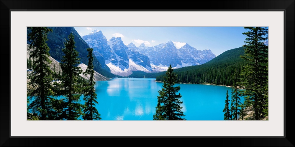 Panoramic photograph of the Valley of Ten Peaks that is located on Moraine Lake within Banff National Park in Alberta, Can...