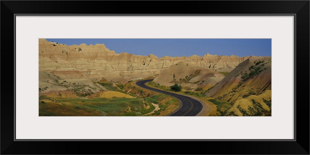 High angle view of a road passing through a landscape, Badlands National Park, South Dakota