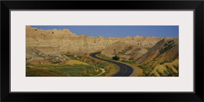 High angle view of a road passing through a landscape, Badlands National Park, South Dakota