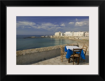 High angle view of a table and a chair in a cafe, Gallipoli, Apulia, Italy