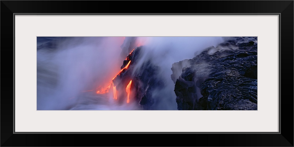 High angle view of lava flowing into the Pacific Ocean, Volcano National Park, Hawaii