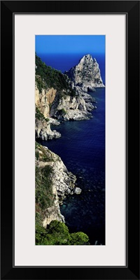 High angle view of rock formations on the coast, Faraglioni, Capri, Italy