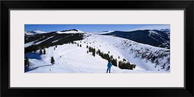 High angle view of skiers skiing, Vail Ski Resort, Vail, Colorado