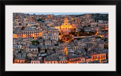 Houses in a town on a hill, Cathedral Of San Giorgio, Modica, Sicily, Italy