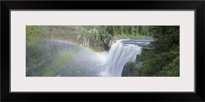 Idaho, Targhee National Forest, Upper Mesa Falls, Aerial view of a rainbow over a waterfall