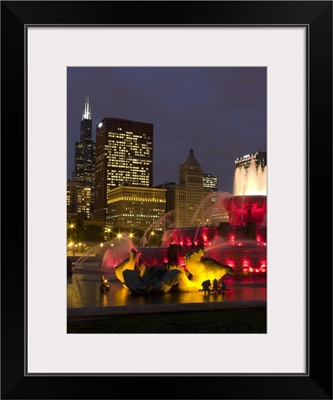 Illuminated fountain with skyscrapers in a city, Buckingham Fountain, Grant Park, Chicago, Illinois,