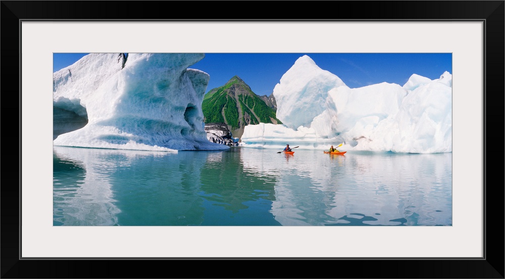 Kayakers in the lake Bear Glacier Lake Kenai Fjords National Park Alaska