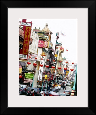 Lanterns hanging across a street, Grant Street, Chinatown, San Francisco, California