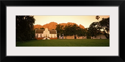 Lawn in front of a Cape Dutch Style house with a mountain and Simonsberg in the background, Stellenbosch, Cape Winelands, Western Cape Province, South Africa