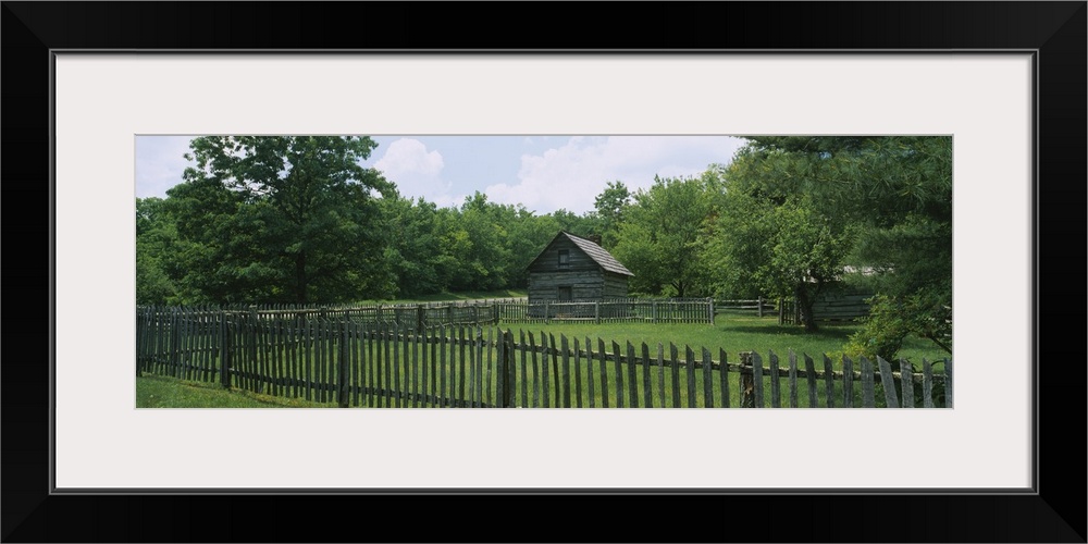 Log cabin surrounded by picket fence, Puckett Cabin, Blue Ridge Parkway, Virginia