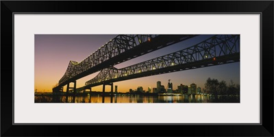Low angle view of a bridge across a river, New Orleans, Louisiana