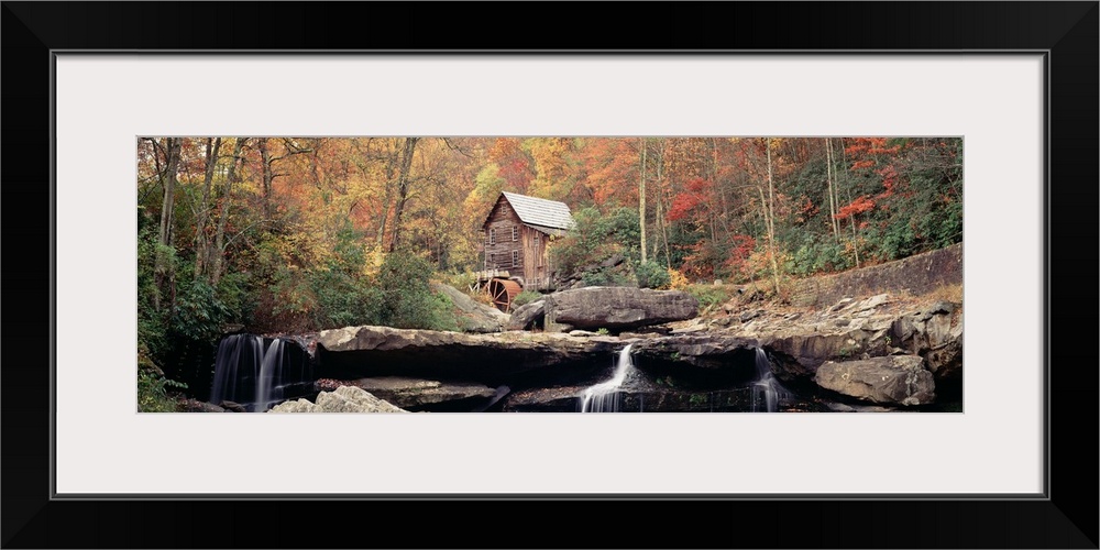 A water mill above a waterfall in Babcock State Park, West Virginia in the fall.