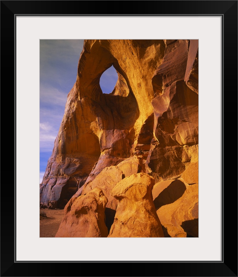 Low angle view of a natural arch, Suns Eye Arch, Monument Valley Tribal Park, Arizona