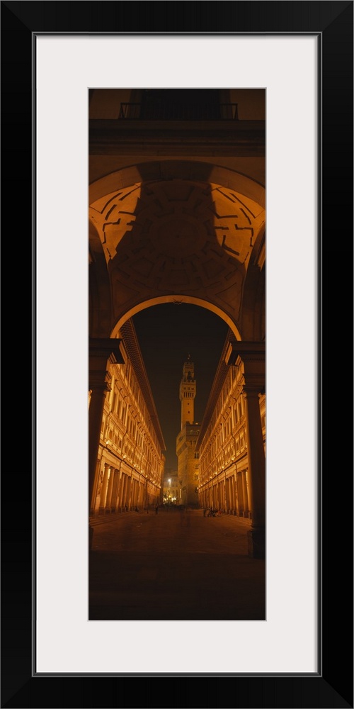 Low angle view of an archway on the street, Galleria Degli Uffizi, Pallazo Vecchio, Florence, Tuscany, Italy
