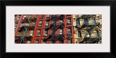 Low angle view of fire escapes on buildings, Little Italy, Manhattan, New York City, New York State