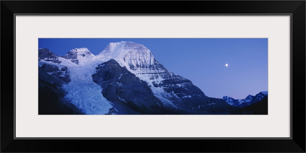 Low angle view of snowcapped mountains, Mt Robson, Mount Robson Provincial Park, British Columbia, Canada