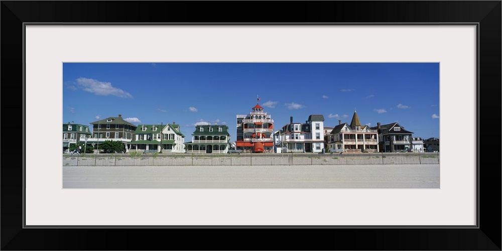 Bright, beach homes on a cloudy day on Main Street Cape in May, New Jersey.