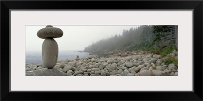 Maine, Acadia National Park, Cairn on the rocky beach