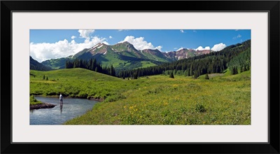 Man fly-fishing in Slate River, Crested Butte, Gunnison County, Colorado