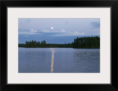 Moon rising over Lake One, water reflection, Boundary Waters Canoe Area Wilderness, Minnesota